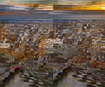 Aerial view of London with Houses of Parliament and Westminster Bridge.