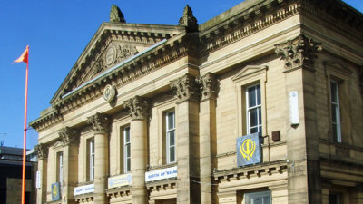 The facade of the former Sion Baptist Chapel on Peckover Street, now a Sikh Gurdwara.