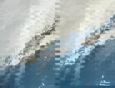 Snow covered mountain and ice shelf